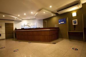 a lobby with a reception desk in a building at Flat Particular em Blue Tree Towers Beira Mar Fortaleza in Fortaleza +32 photos