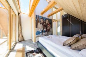 Łóżko lub łóżka w pokoju w obiekcie udanypobyt Apartament Sky SPA