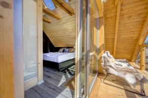 Łóżko lub łóżka w pokoju w obiekcie udanypobyt Apartament Sky SPA