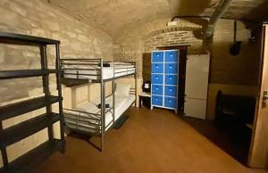 Letto o letti in una camera di Alba Hostel