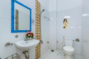 Koupelna v ubytování Nhà phố nguyên căn Free Bida & Loa karaoke - 4 phòng ngủ - 30 Võ Thị Sáu - Bãi sau + 61 fotografií