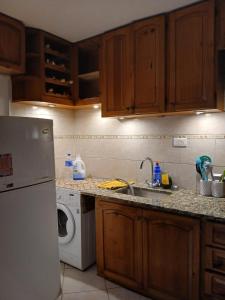 Kuchyň nebo kuchyňský kout v ubytování Departamento Martirena + 5 fotografií