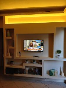 TV a/nebo společenská místnost v ubytování Departamento Martirena