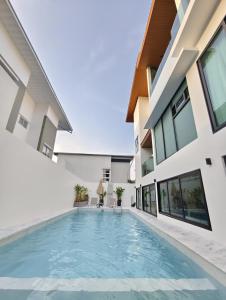 an image of a swimming pool in a house at Mountain breeze villa phuket in Ban Bang Khu