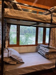 Voodi või voodid majutusasutuse MountRush Adventures Manali toas