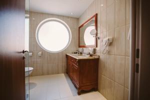 Kúpeľňa v ubytovaní Elixír Medical Wellness Hotel