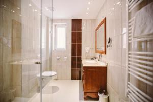 Kúpeľňa v ubytovaní Elixír Medical Wellness Hotel