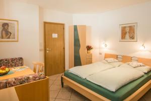 Postel nebo postele na pokoji v ubytování Appartment Plottenbäck
