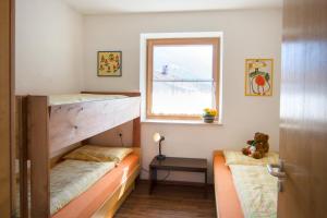 Postel nebo postele na pokoji v ubytování Appartment Plottenbäck
