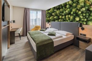 Postel nebo postele na pokoji v ubytování Best Western Hotel München Airport + 37 fotografií