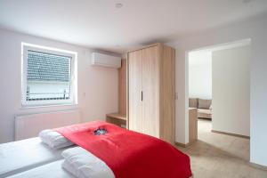 Postel nebo postele na pokoji v ubytování B&S Hotel