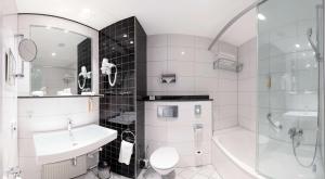 Ванная комната в Best Western Plus Palatin Kongresshotel