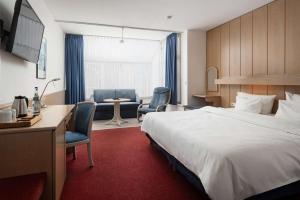 Postel nebo postele na pokoji v ubytování Best Western Hotel Heide