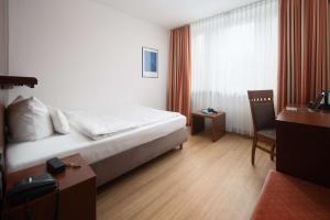 Postel nebo postele na pokoji v ubytování Best Western Hotel Heide