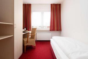Postel nebo postele na pokoji v ubytování Best Western Hotel Heide