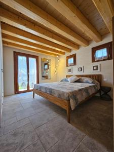 a bedroom with a large bed in a room at Alla Rocca Storica in Cavallino-Treporti
