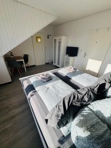 Postel nebo postele na pokoji v ubytování Die Schlafstube