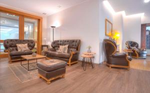 Ein Sitzbereich in der Unterkunft Best Western Hotel Brunnenhof