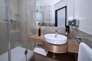 Ein Badezimmer in der Unterkunft Best Western Hotel Brunnenhof