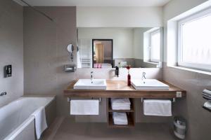 Ein Badezimmer in der Unterkunft Best Western Hotel Brunnenhof