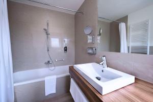 Ein Badezimmer in der Unterkunft Best Western Hotel Brunnenhof