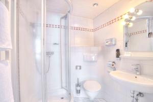Ein Badezimmer in der Unterkunft Best Western Hotel Brunnenhof
