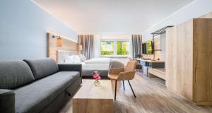 Ein Sitzbereich in der Unterkunft Best Western Hotel Brunnenhof