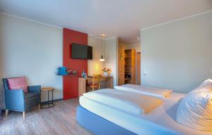 Ein Bett oder Betten in einem Zimmer der Unterkunft Best Western Hotel Brunnenhof