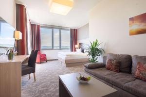 Postel nebo postele na pokoji v ubytování Best Western Hotel Dreiländerbrücke Weil am Rhein / Basel + 37 fotografií