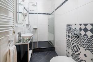 Kúpeľňa v ubytovaní Best Western Plus Celebrity Suites