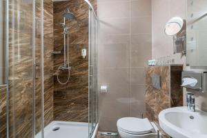 Kúpeľňa v ubytovaní Best Western Plus Celebrity Suites