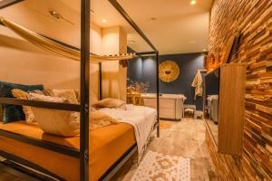 Postel nebo postele na pokoji v ubytování Pandora Spa Lille