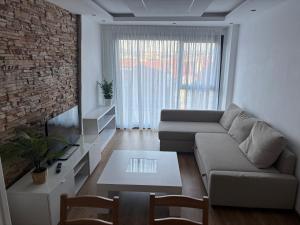 TV a/nebo společenská místnost v ubytování As Mirandas Apartment