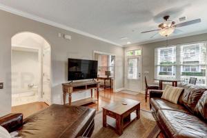a living room with a couch and a table at 2142 Cape Sound condo in Fernandina Beach