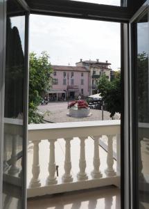 a view from a window of a balcony at Relais Dogana in Moniga