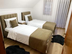 Postel nebo postele na pokoji v ubytování Chalet Kujta