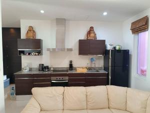 Η κουζίνα ή μικρή κουζίνα στο Beach Pearl Villa