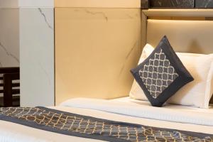 Postel nebo postele na pokoji v ubytování Hotel DELHI 37 by STAR GROUP