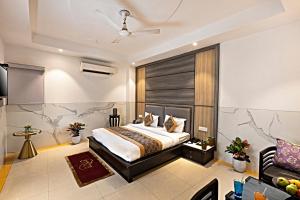 Postel nebo postele na pokoji v ubytování Hotel DELHI 37 by STAR GROUP