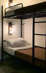 Postel nebo postele na pokoji v ubytování MBZ - Nice Bed Space "MEN"