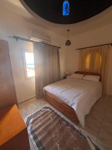 Letto o letti in una camera di Dahab Lodge