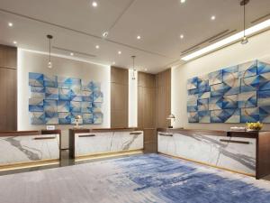 Hilton Taipei Sinban 객실 침대