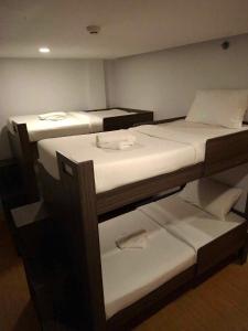 Voodi või voodid majutusasutuse Rudhil's Place Hotel toas
