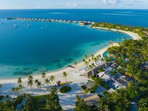 an aerial view of a beach with a resort at Waldorf Astoria Maldives Ithaafushi in South Male Atoll