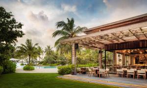 a rendering of the patio at the resort at Waldorf Astoria Maldives Ithaafushi in South Male Atoll
