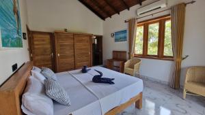 Postel nebo postele na pokoji v ubytování Sunny Villa