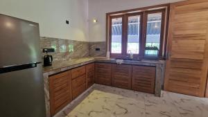 Kuchyň nebo kuchyňský kout v ubytování Sunny Villa