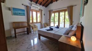 Postel nebo postele na pokoji v ubytování Sunny Villa
