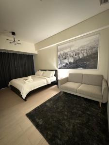 Ένα ή περισσότερα κρεβάτια σε δωμάτιο στο 81 Newport Blvd Cluster 4 Unit B 3rd flr by Rechelle Nunag