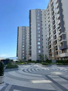 a large parking lot with two tall buildings at Studio79 in Plovdiv